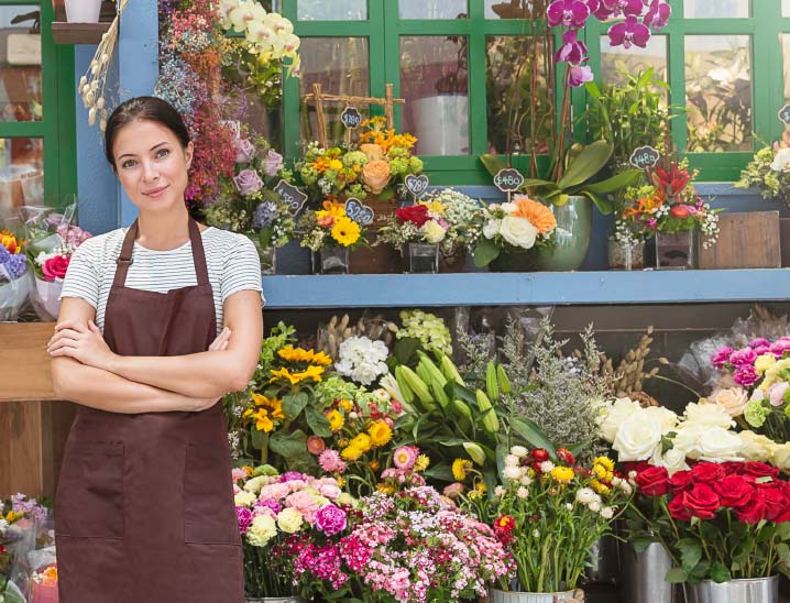 lady standing outside flower shop